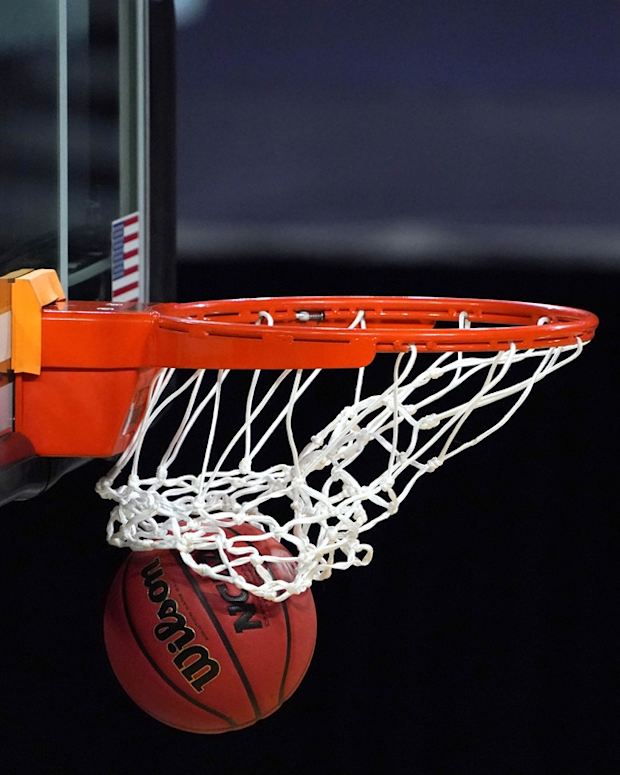Mar 5, 2021; Las Vegas, NV, USA; A general view of a Wilson NCAA official basketball and rim and net during a Pac-12 Conference women's tournament semifinal between the Arizona Wildcats and the UCLA Bruins at Mandalay Bay Events Center. Mandatory Credit: Kirby Lee-USA TODAY Sports